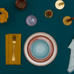 Place setting on Essential Cotton Tablecloth in Peacock.