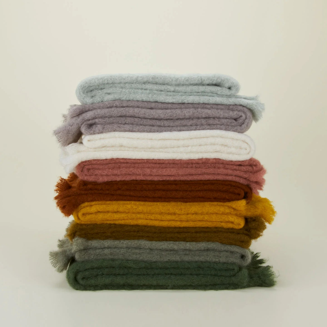 Mohair throws in various colors