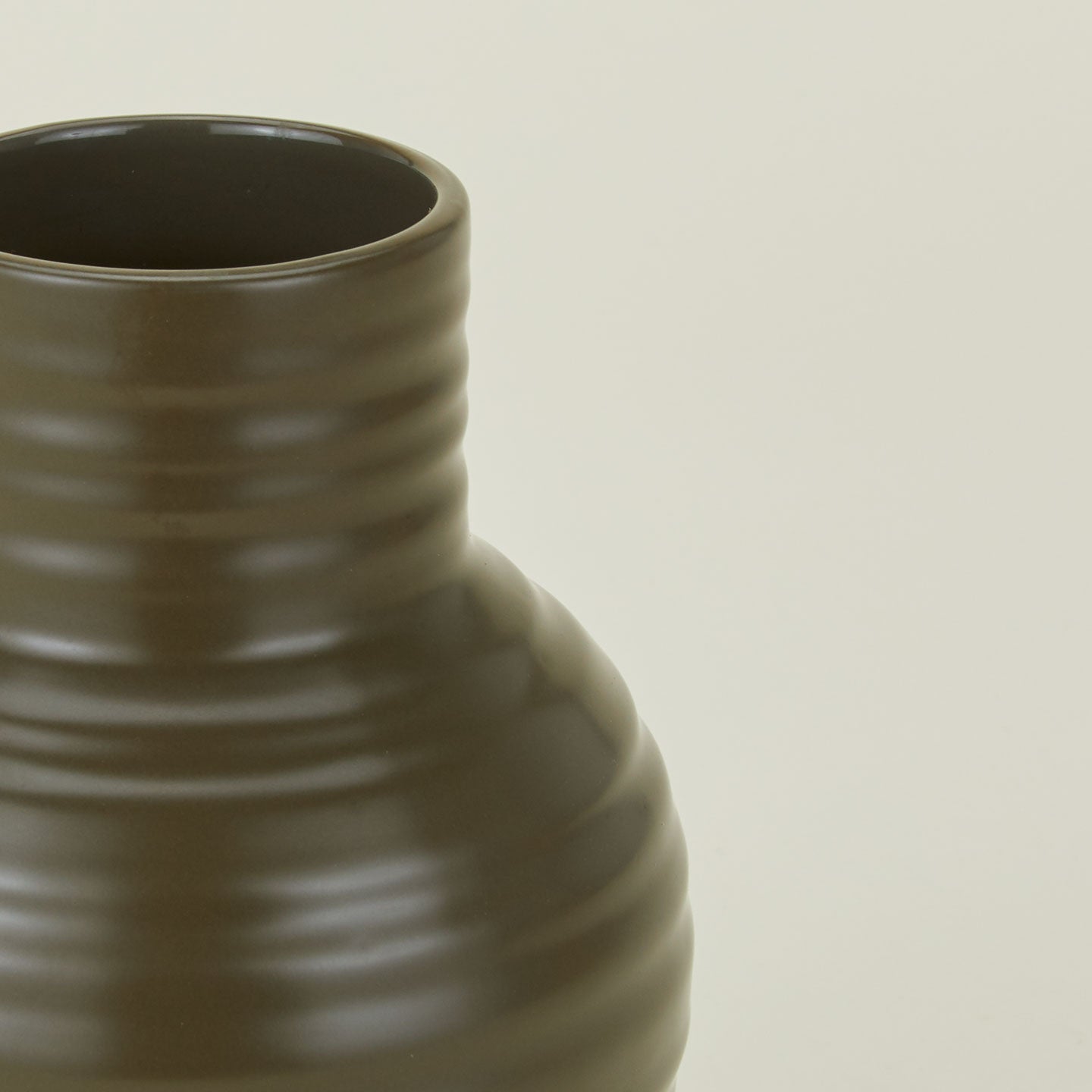 Close up of Essential Ceramic Vase in Olive.