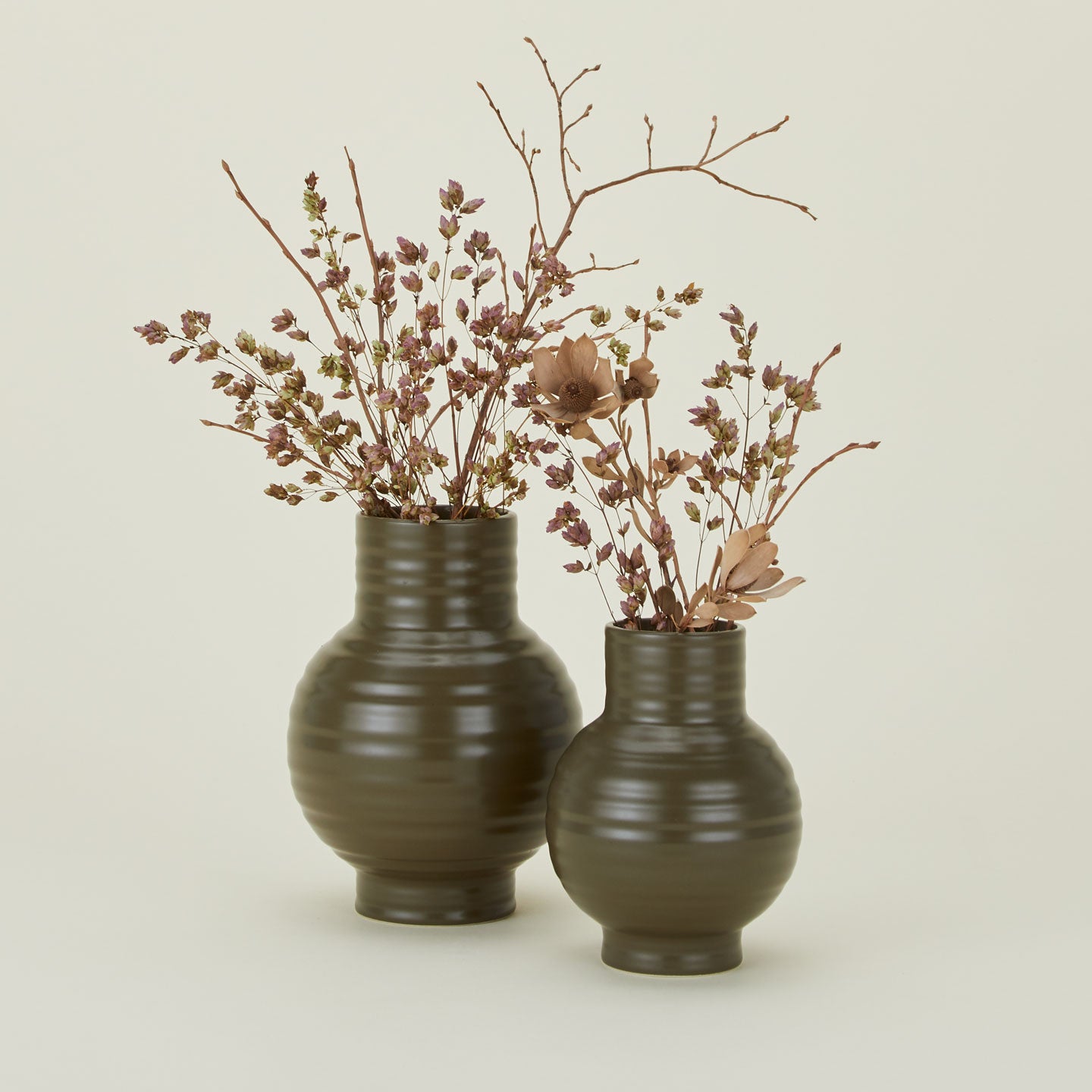 Essential Ceramic Vase in Olive in Small and Large sizes with flowers.