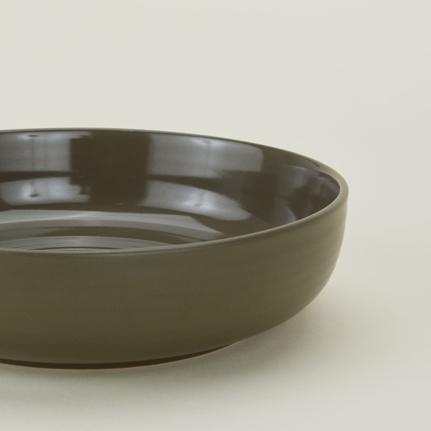 Close up of Essential Low Bowl in Olive.