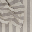 Close up of Essential Striped Dinner Napkin in Light Grey and Dark Grey.