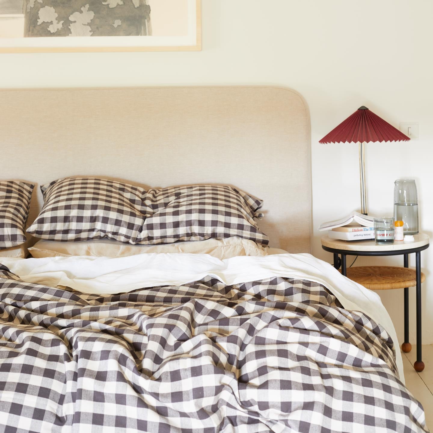 Essential Gingham Bedding in Black with nightstand and Essential Glass Pitcher in Smoke.