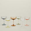 Cocktail coupe glasses in a variety of colors.