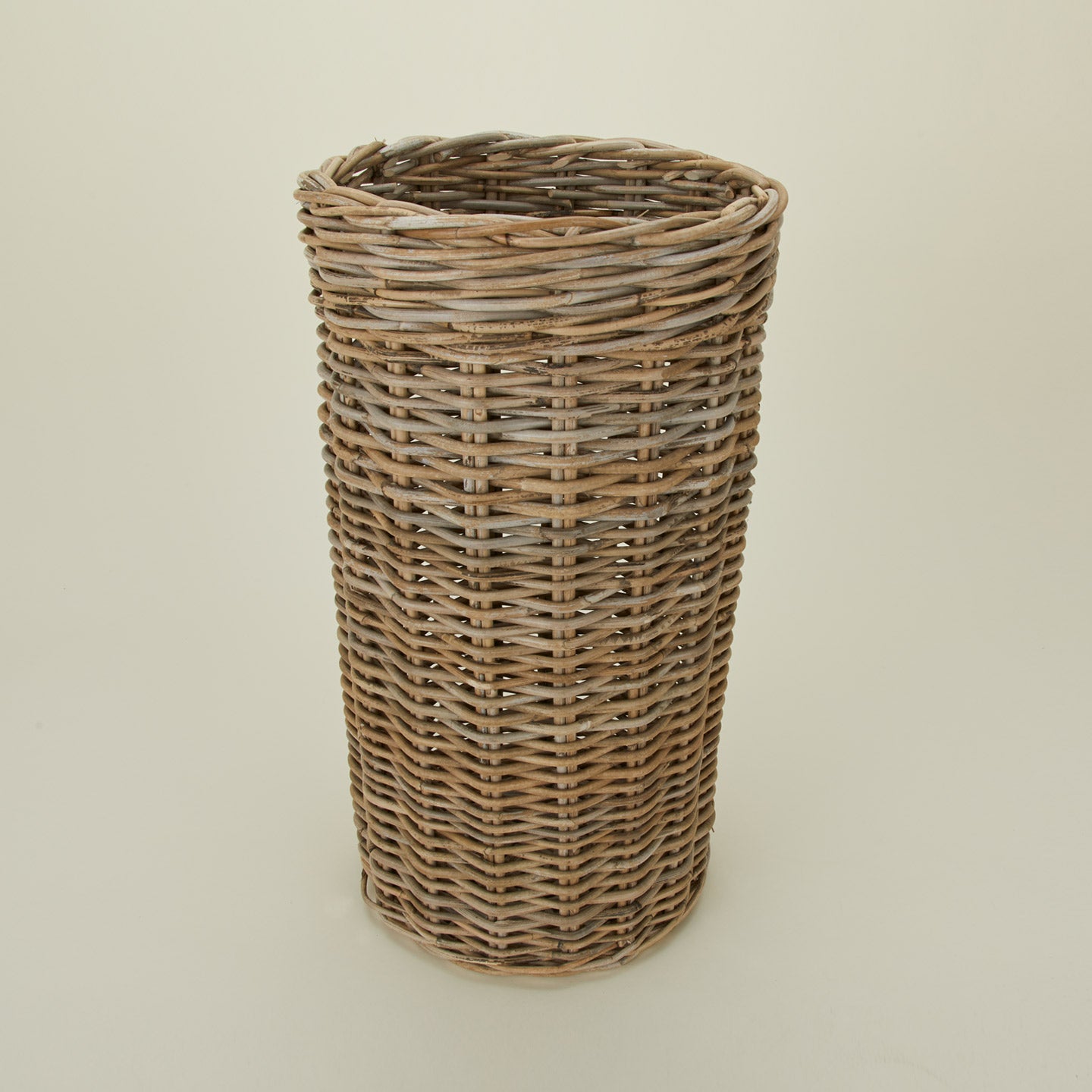 Close up view of rattan umbrella stand.