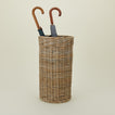Rattan umbrella stand with umbrellas