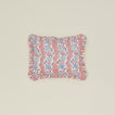 Block printed floral ruffled pillow in blush.
