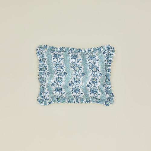 Block printed floral ruffled pillow in indigo.