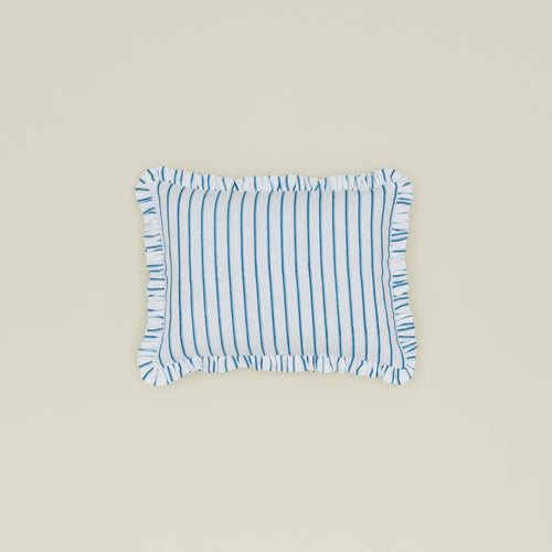 Block printed striped ruffled pillow in indigo.