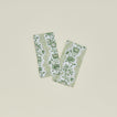 A set of two block printed napkins with a floral pattern in olive.