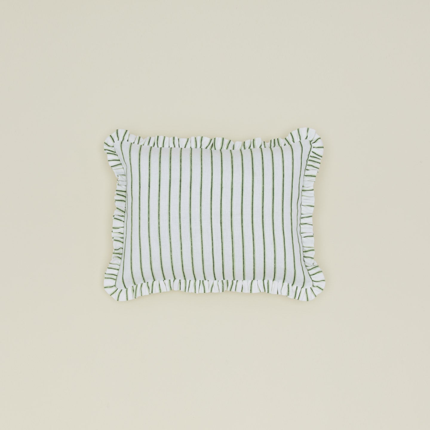 Block printed striped ruffled pillow in olive.
