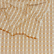 close up view of Dove and Donkey hopsack tablecloth in honey