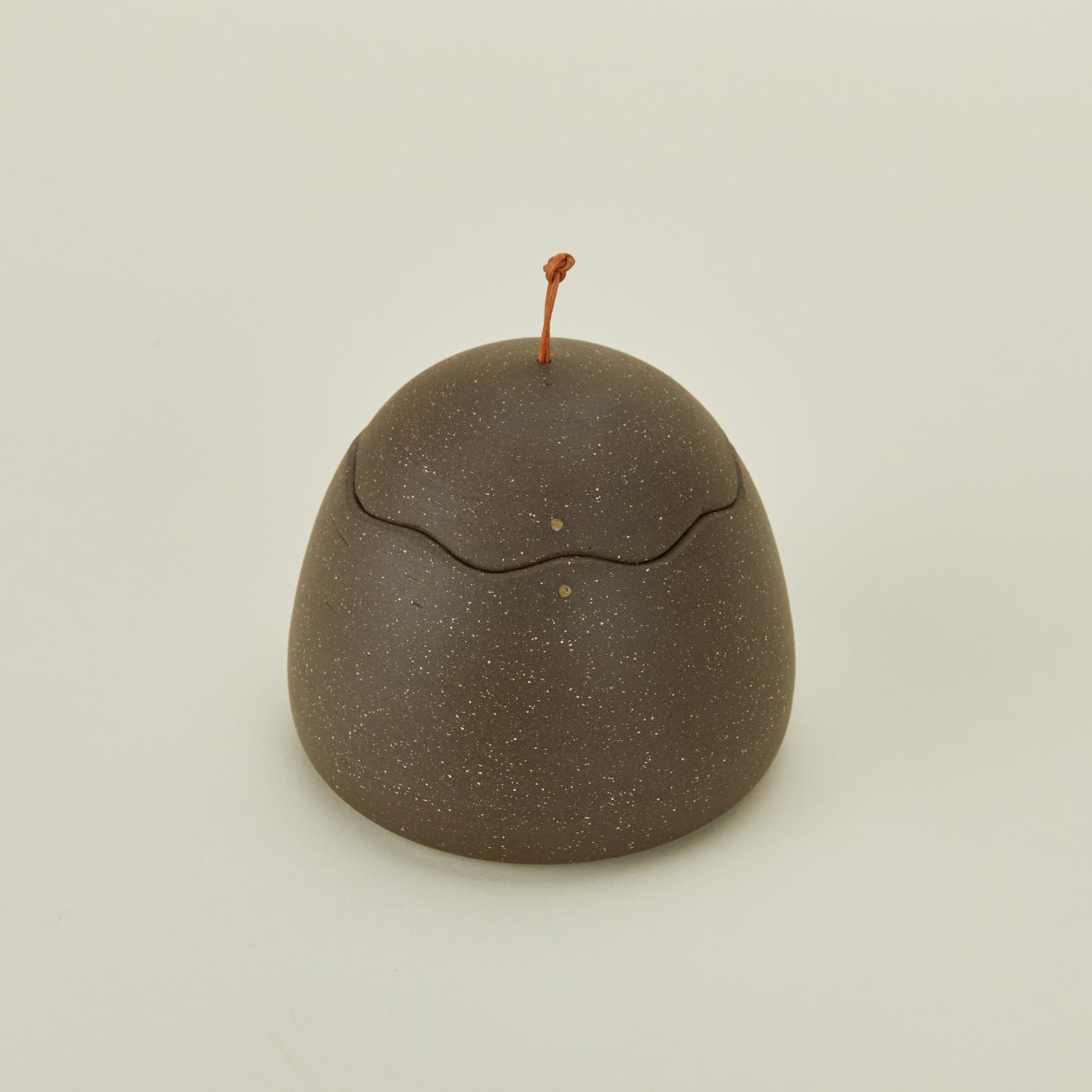 Detailed view of stoneware squiggle jar