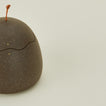 Close up view of stoneware squiggle jar