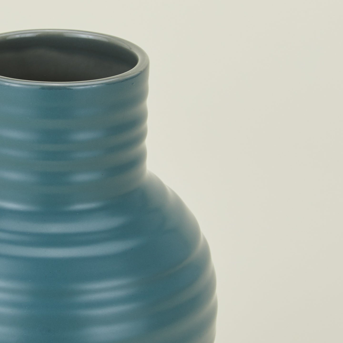 Close up view of essential ceramic vase in peacock