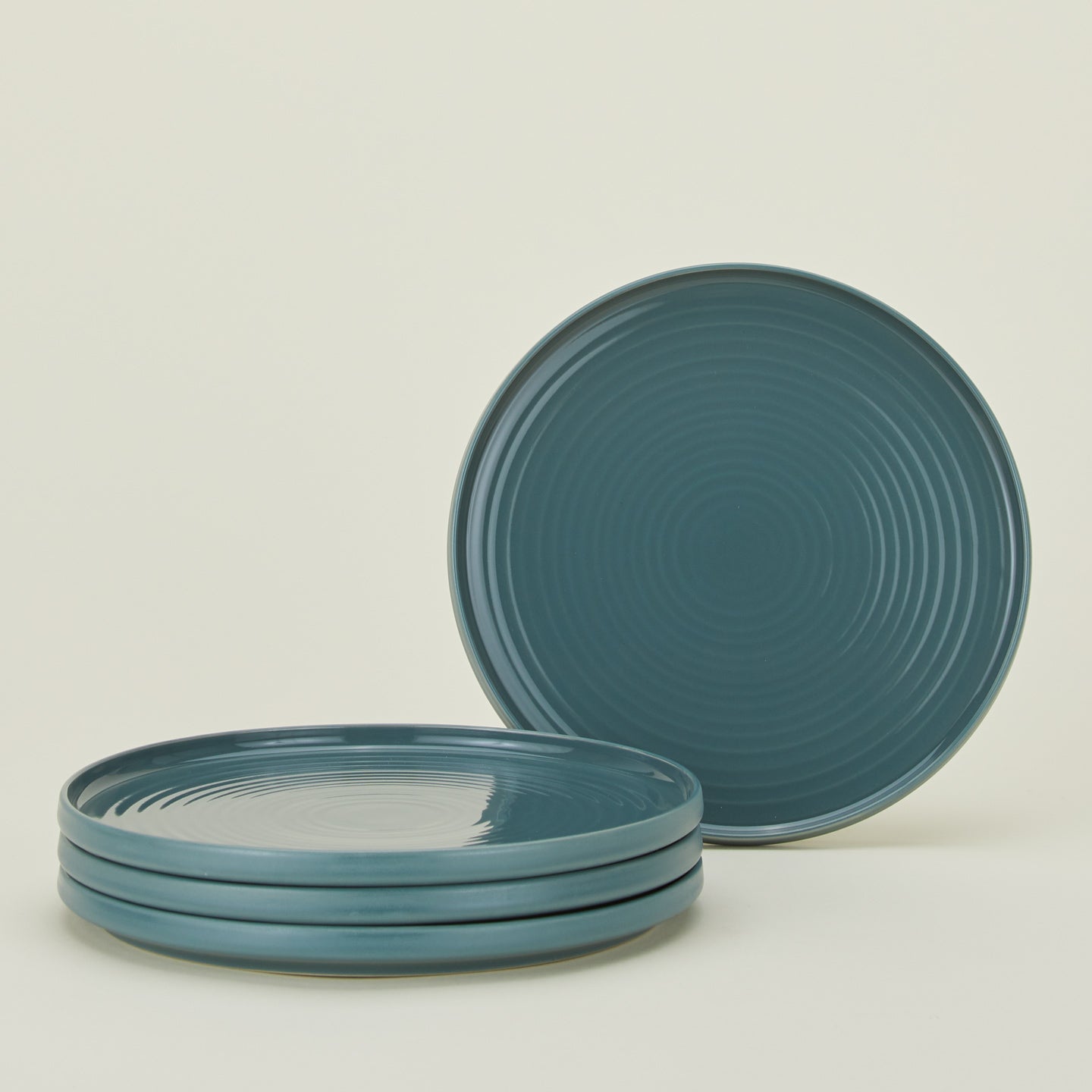 Set of 4 essential dinner plates in peacock
