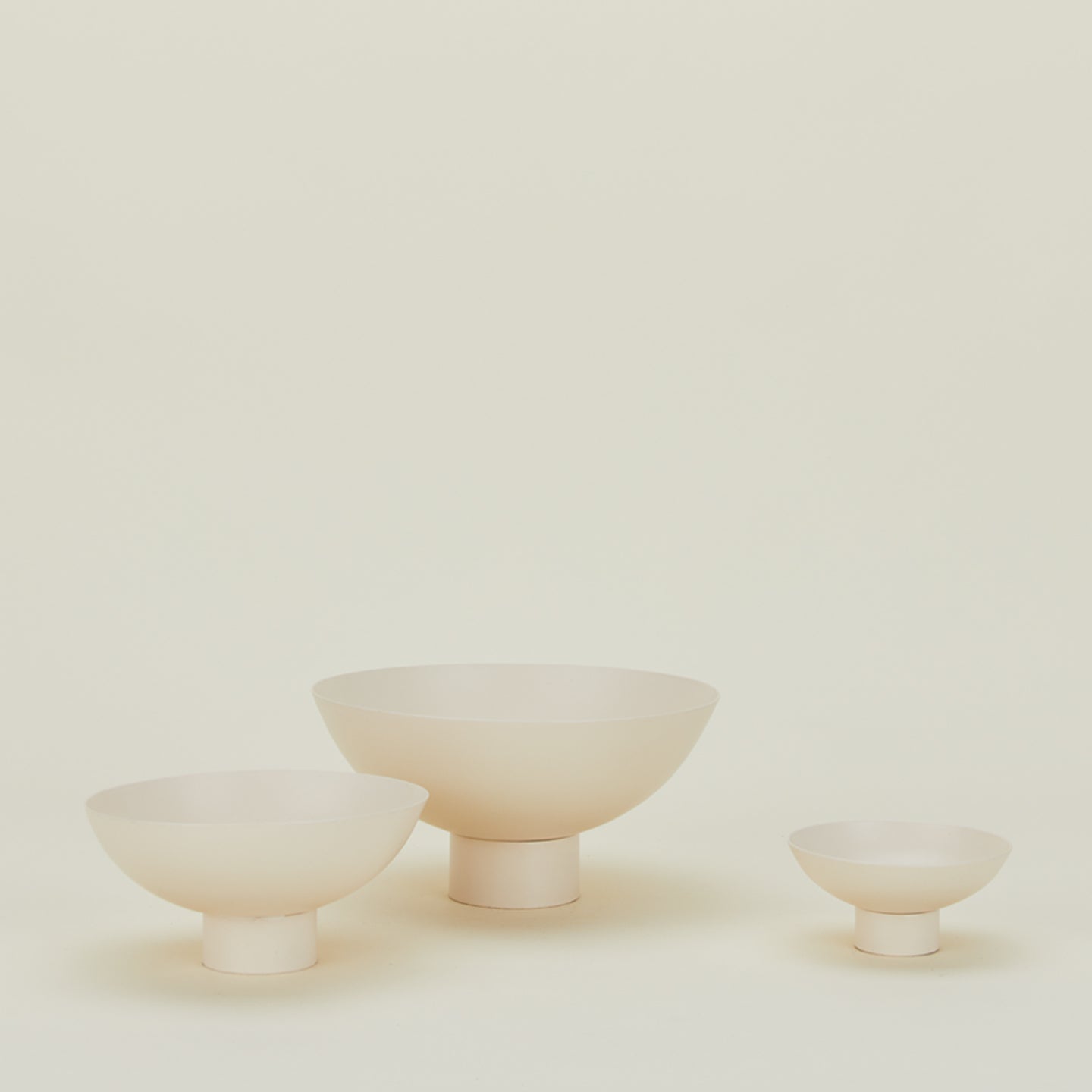Essential footed bowl family in ivory