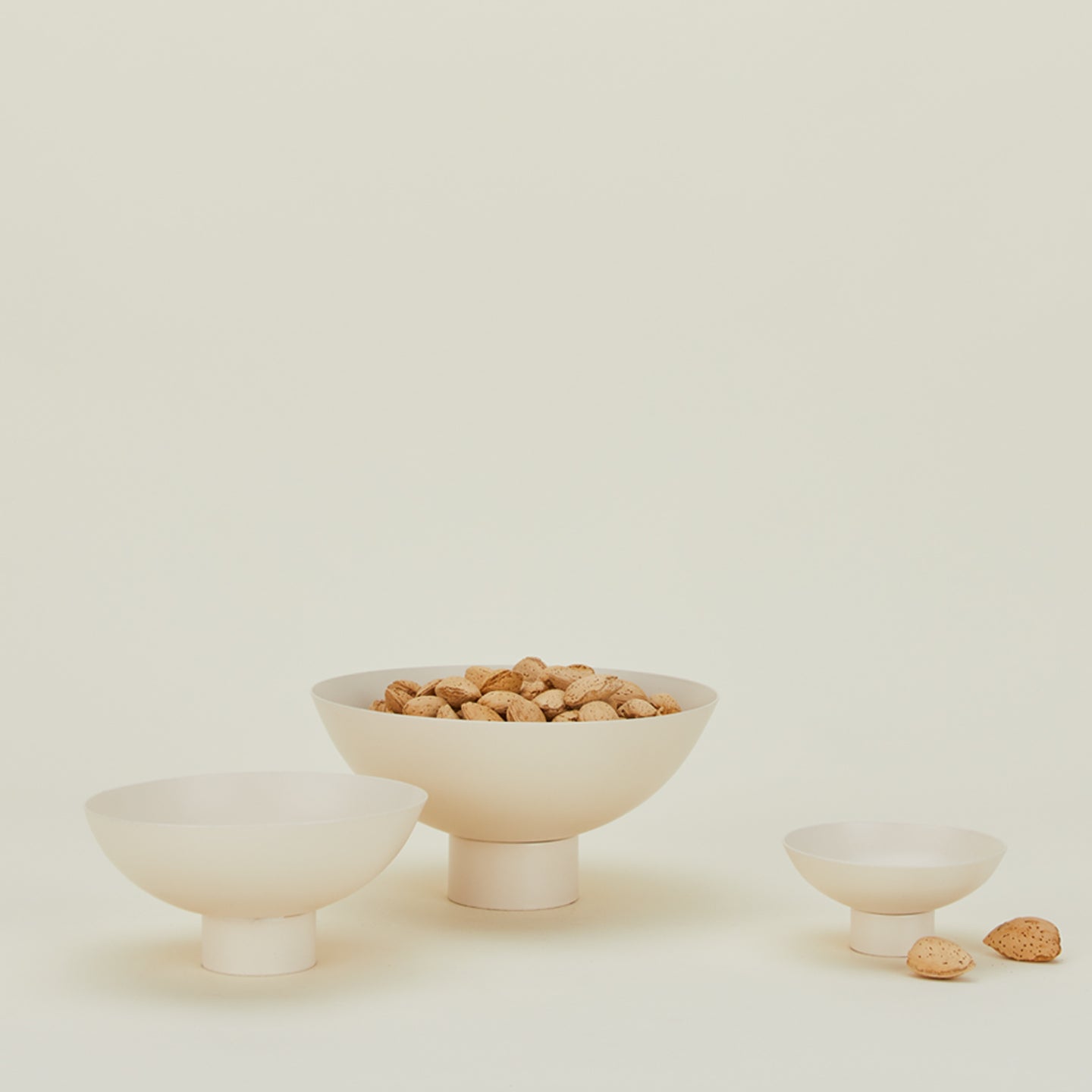 Essential footed bowl family in ivory