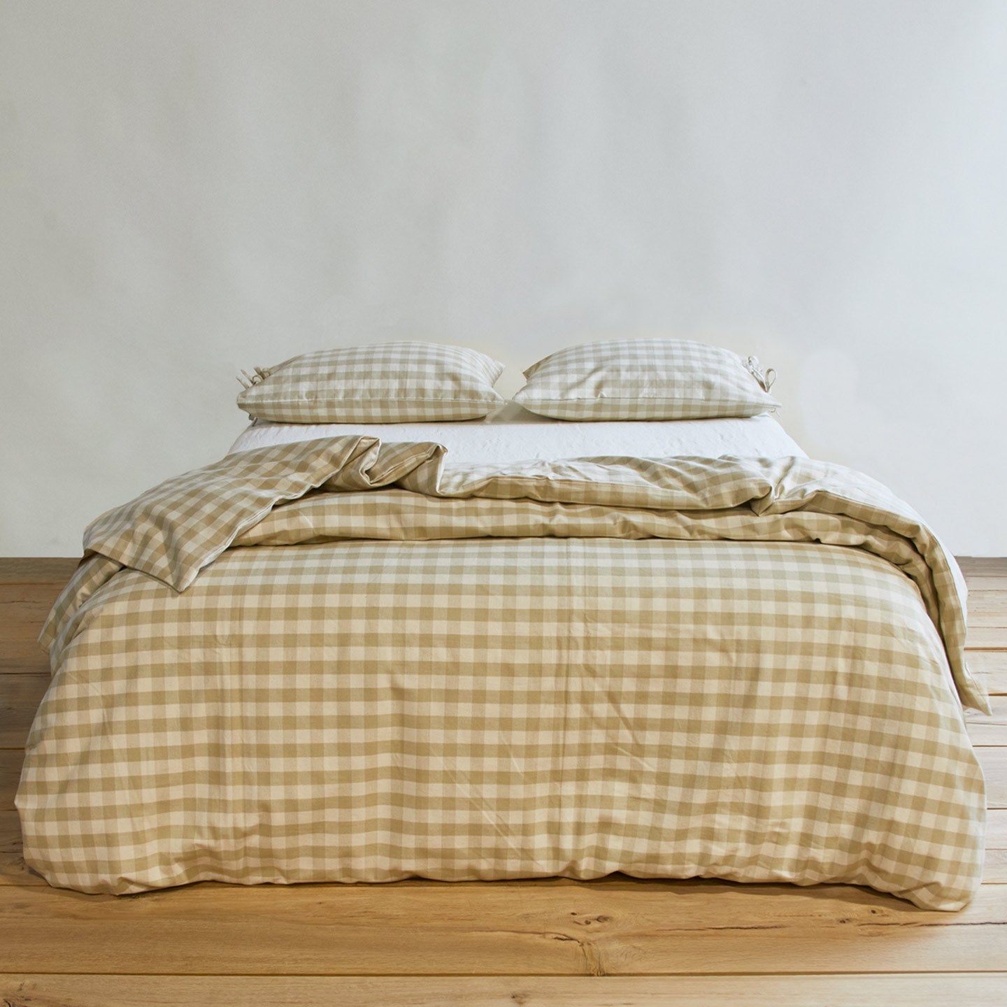 Essential Gingham Duvet - Ivory/Flax on bed with matching pillow cases