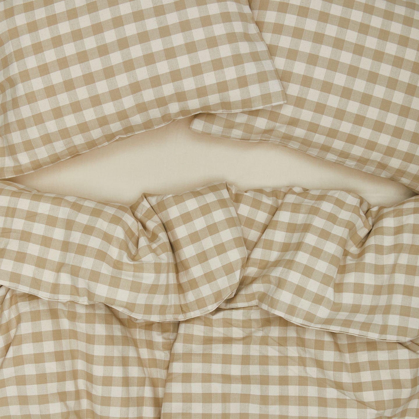 Essential Gingham Pillowcases, Set of 2 - Ivory/Flax on bed with matching duvet cover