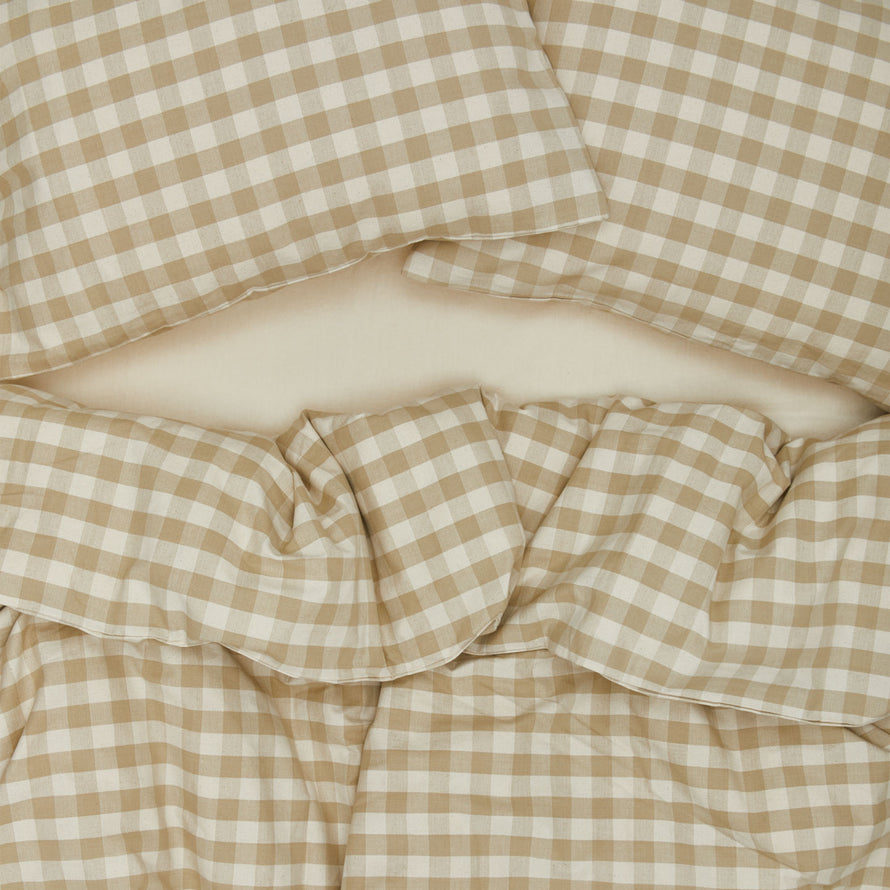 Essential Gingham Duvet - Ivory/Flax on bed with matching pillow cases
