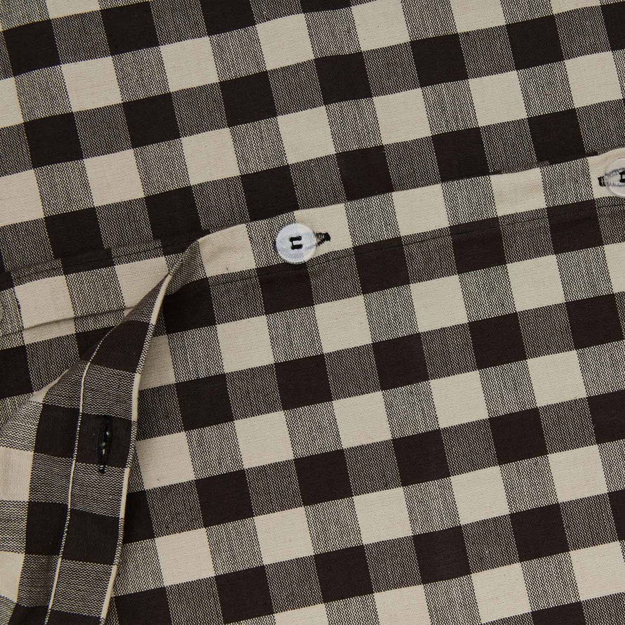 Close up view of essential gingham duvet cover in light grey/black