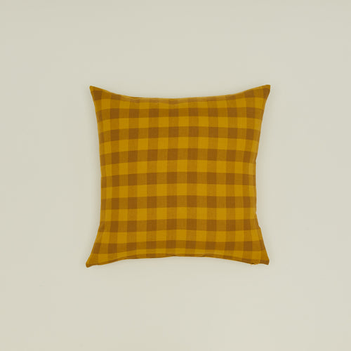 Gingham square pillow in mustard/bronze