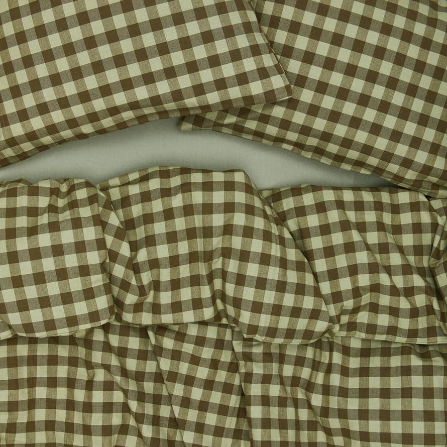 Essential Gingham Duvet - Sage/Olive on bed with matching pillow cases