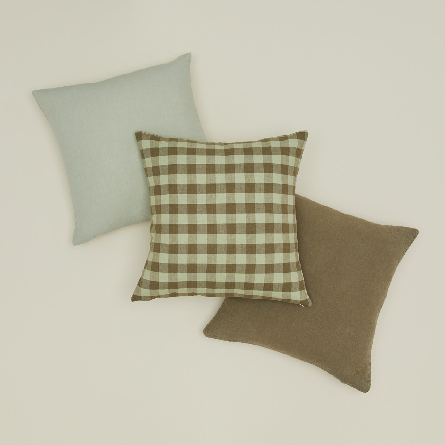 Essential gingham pillow in sage / olive with simple linen pillows in sage and olive