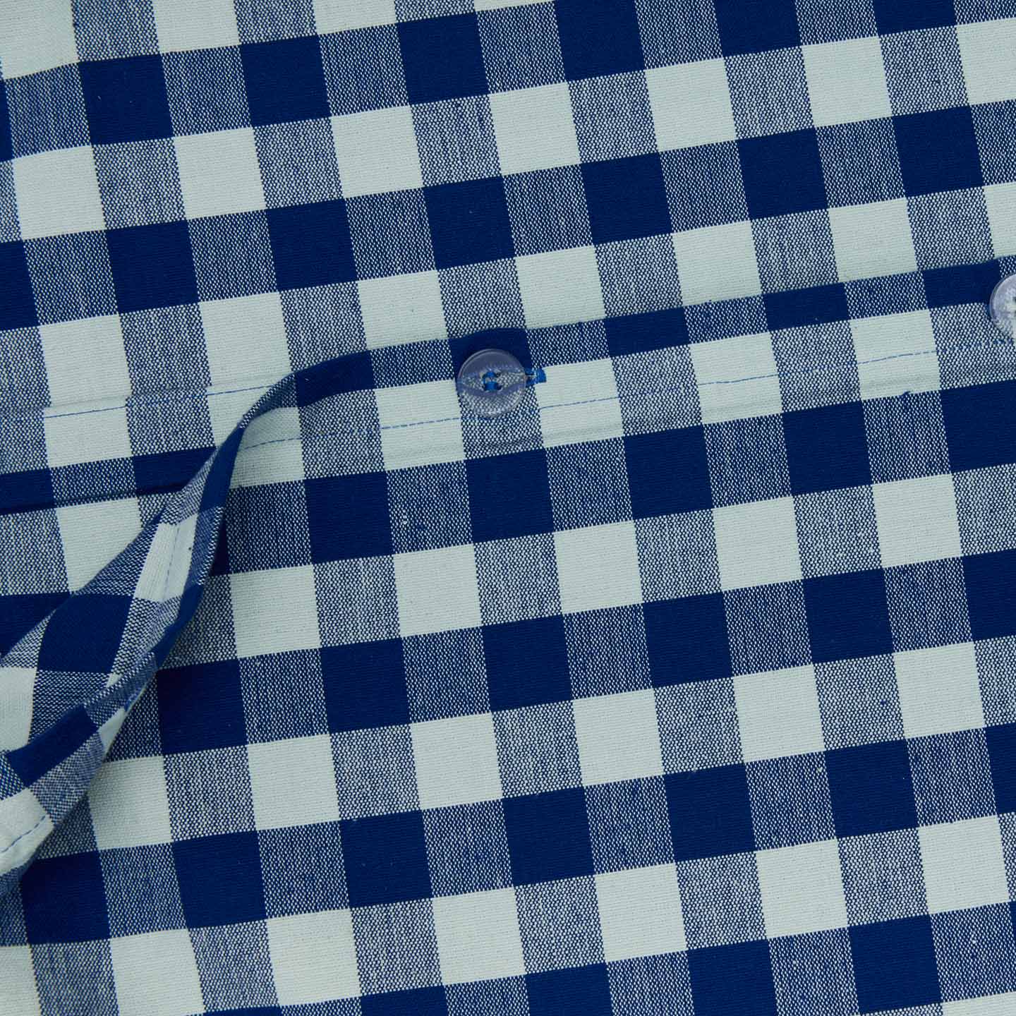 Close up view of essential gingham duvet in sky/blue