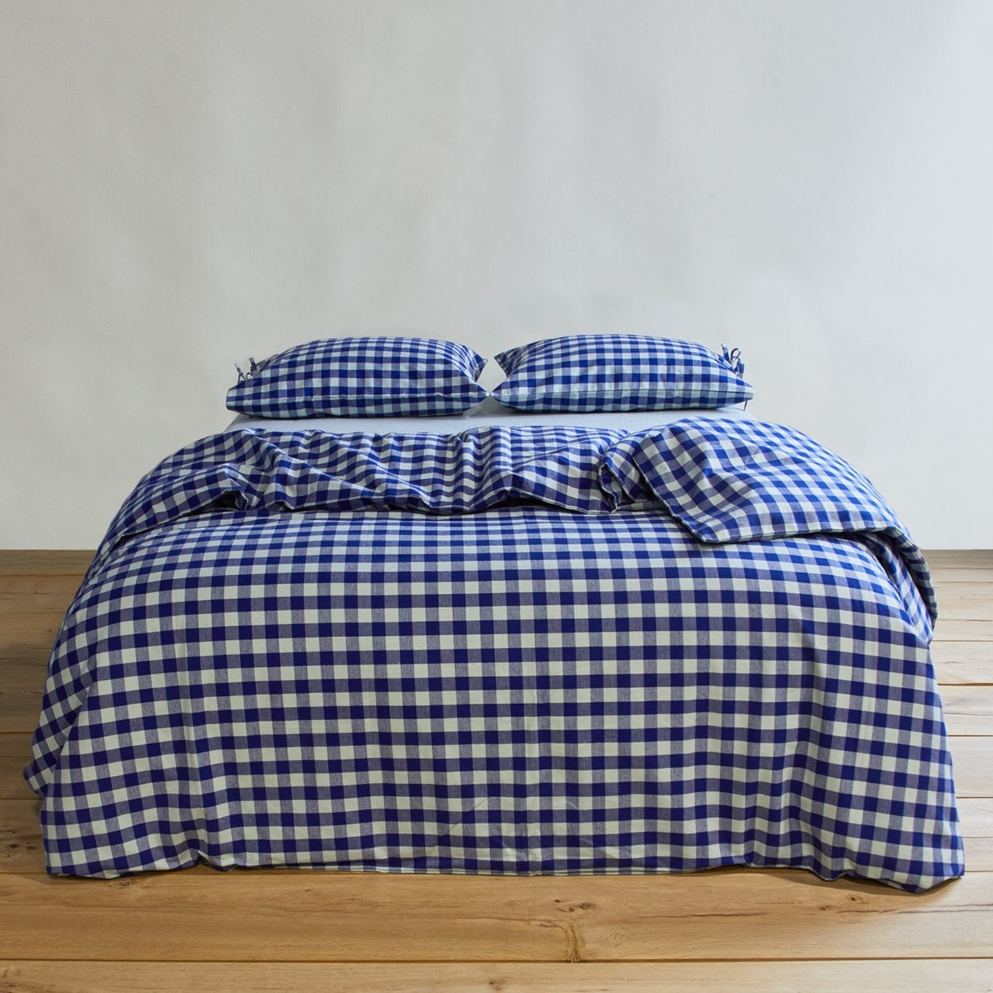 Essential Gingham Duvet - Sky/Blue on bed with matching pillow cases