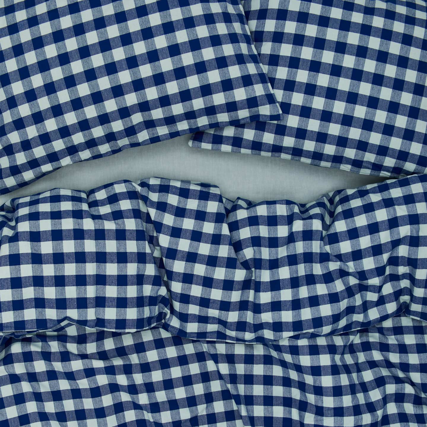 Essential Gingham Pillowcases, Set of 2 - Sky/Blue on bed with matching duvet cover