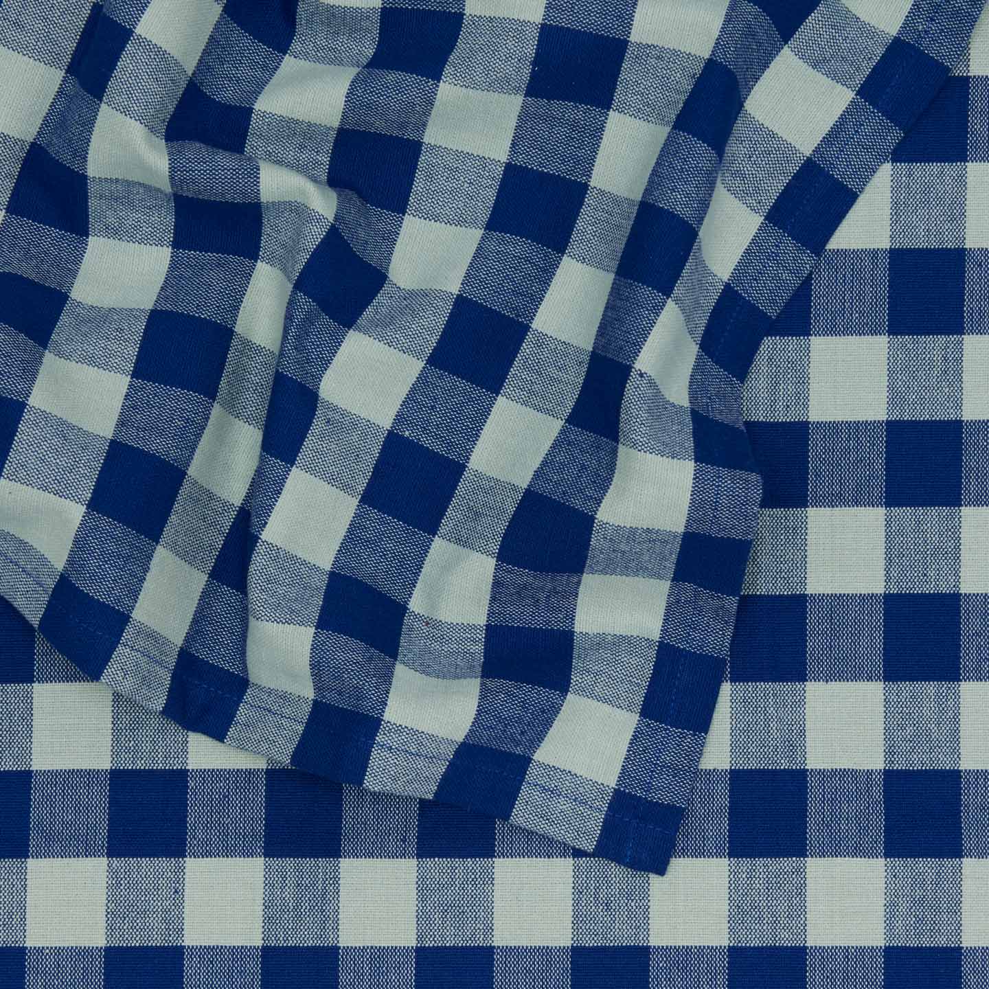 Close up view of Essential Gingham tablecloth in sky/blue