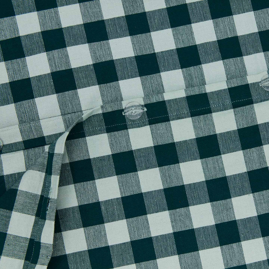 Close up view of essential gingham duvet cover in sky/peacock