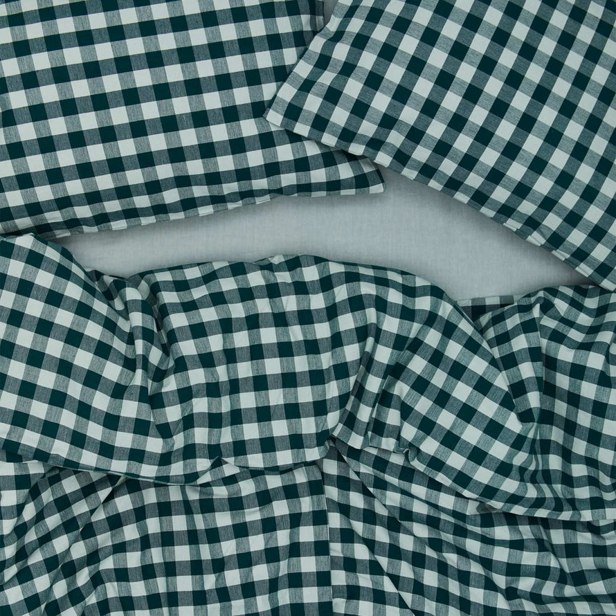 Essential Gingham Pillowcases, Set of 2 - Sky/Peacock on bed with matching duvet cover