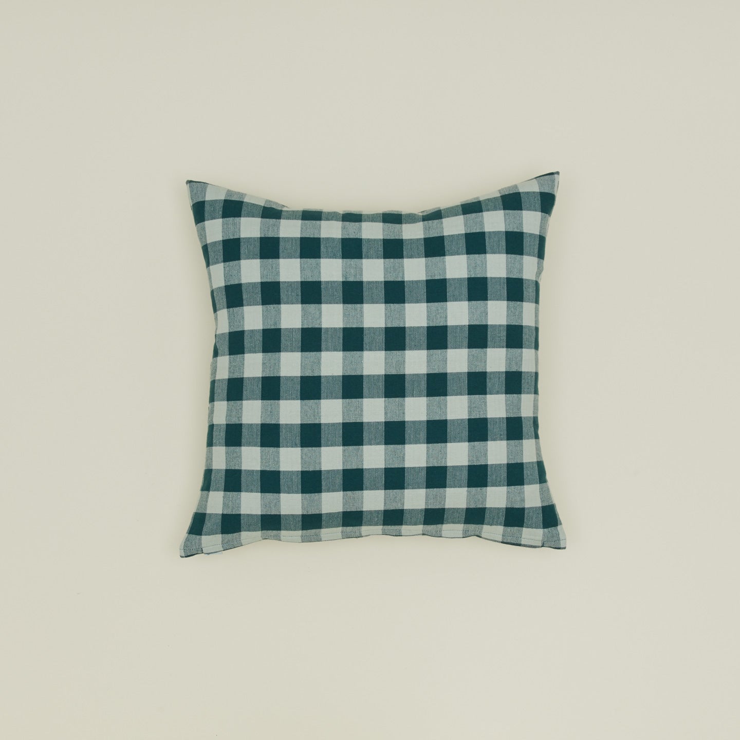 Gingham square pillow in sky/peacock