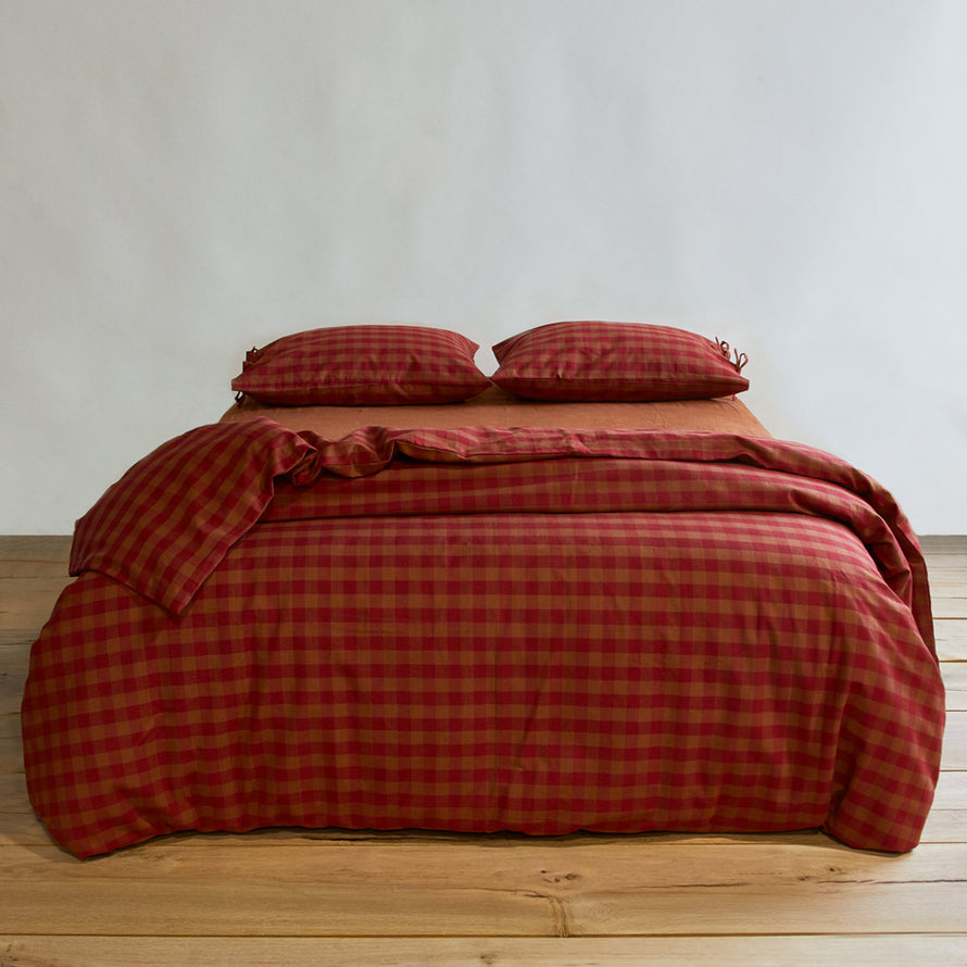 Essential Gingham Duvet - Terracotta/Red on bed with matching pillow cases