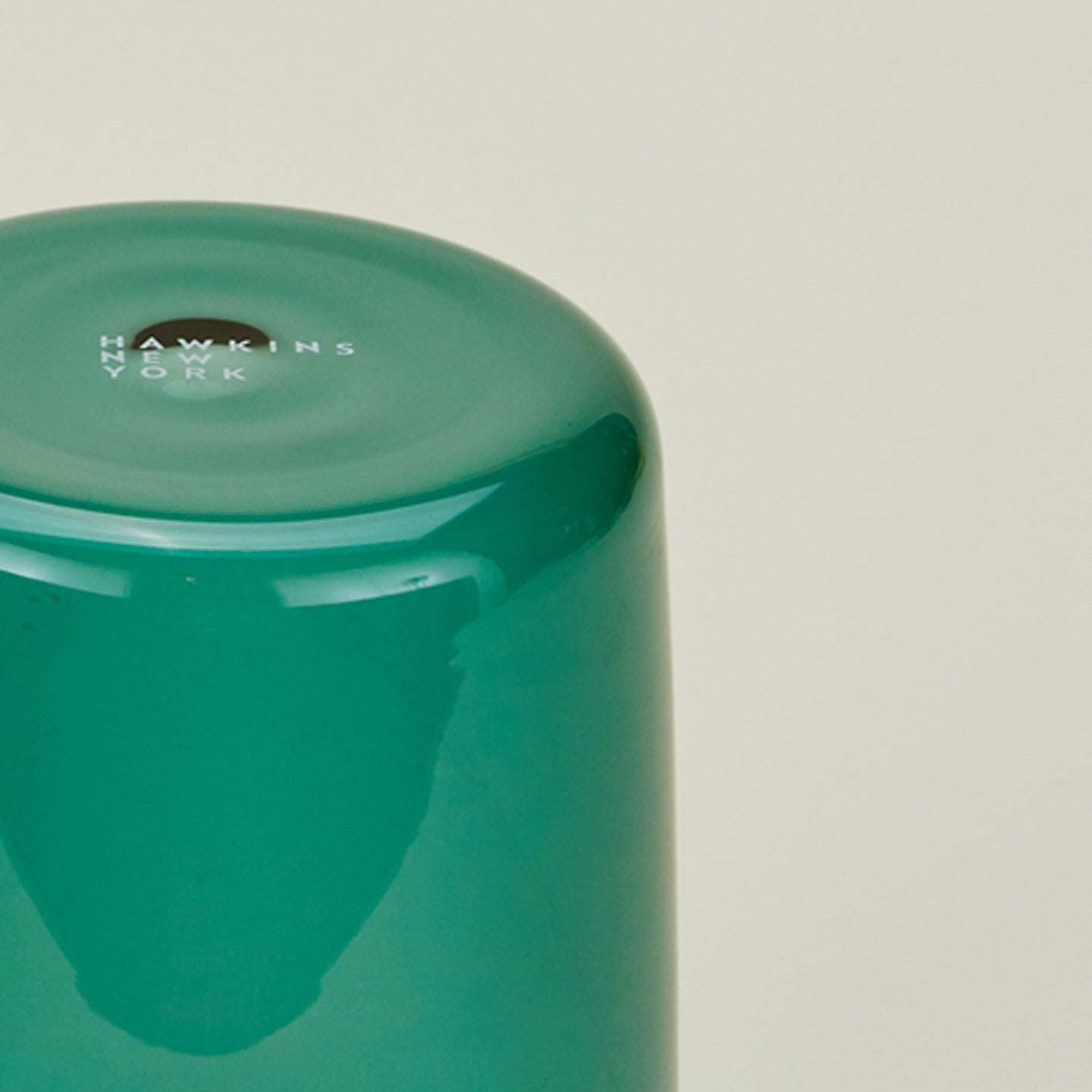 Close up of the bottom of the Essential Glass in Peacock.