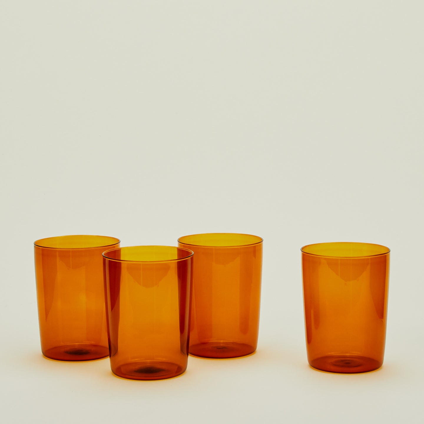 Four Large Essential Glasses in Terracotta.