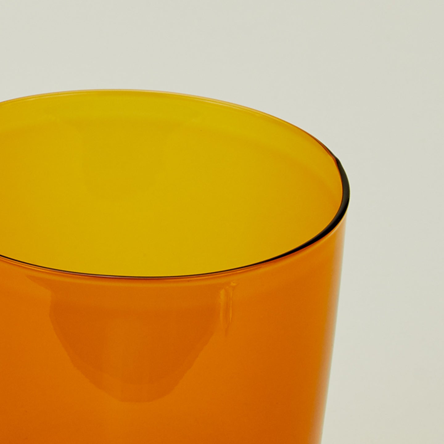Close up of the rim of the Essential Glass in Terracotta.