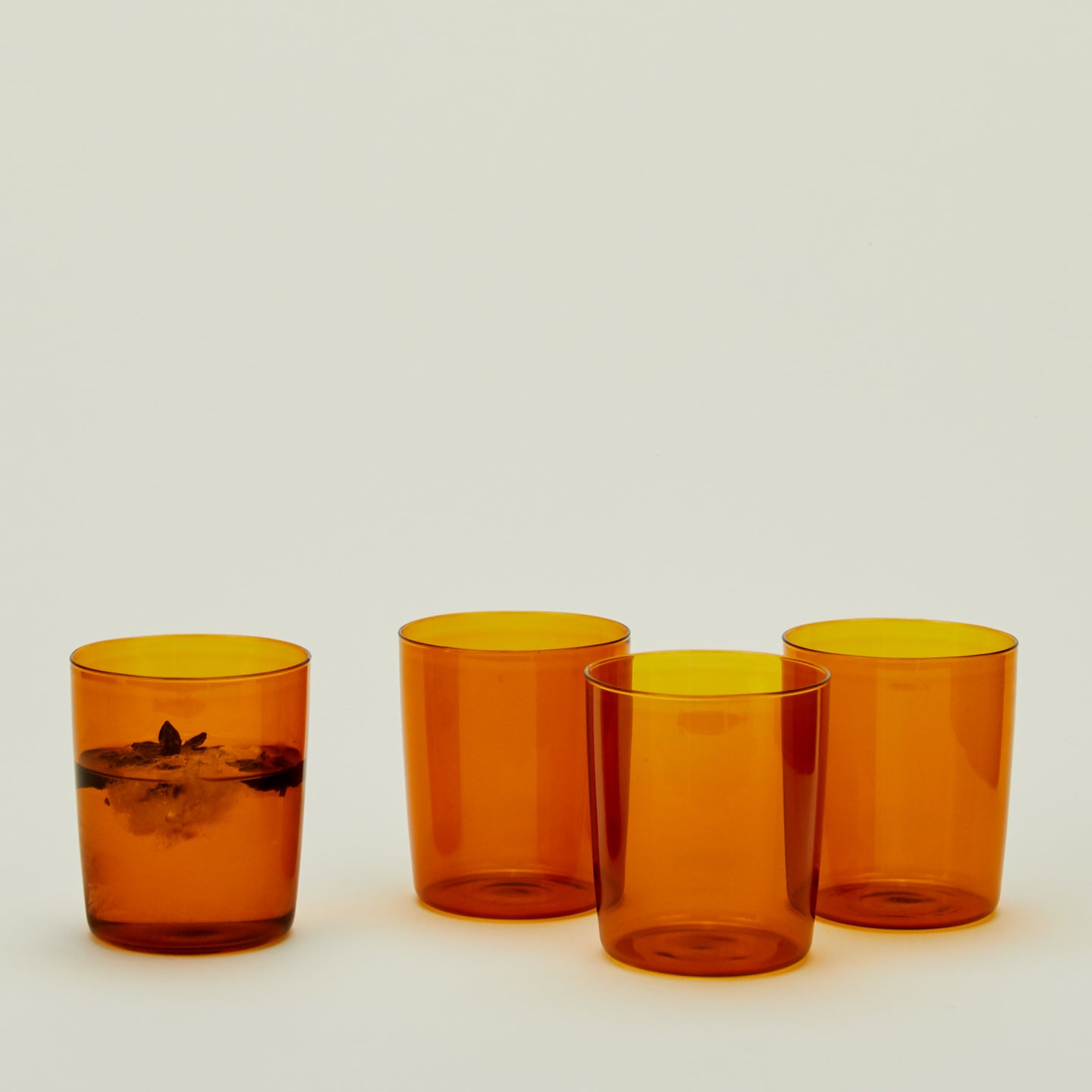 Four Medium Essential Glasses in Terracotta.