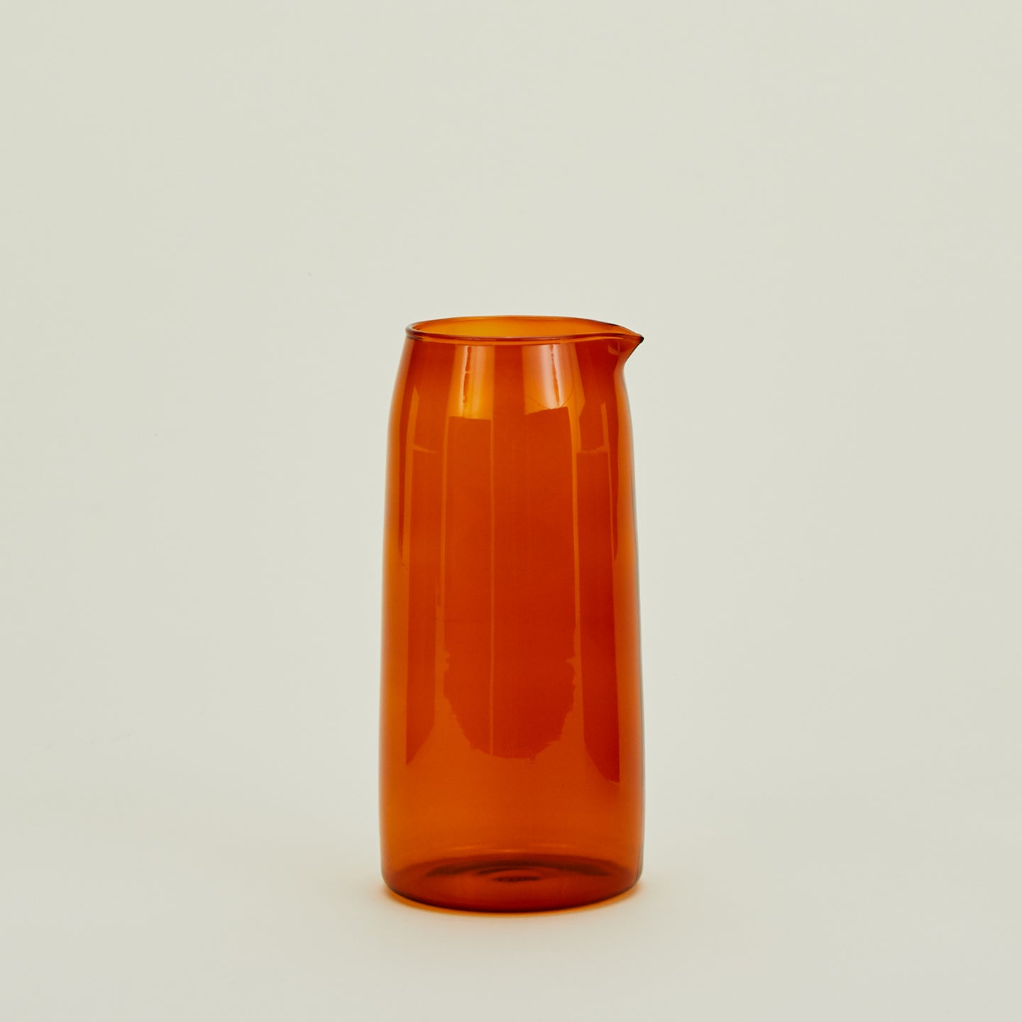 Essential Glassware Pitcher in Terracotta.