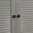 Small black essential sphere knobs on louvered doors