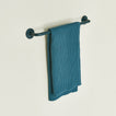 Small towel bar in Dark Peacock with waffle dish towel.