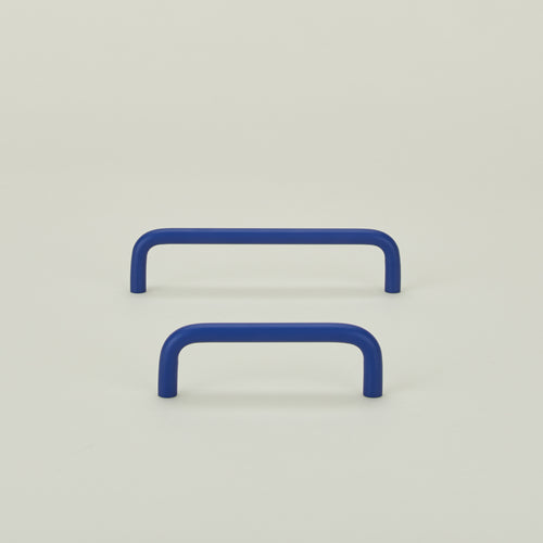 Large and small essential drawer pulls in klein blue