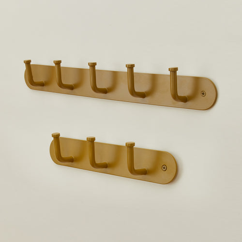 Essential hook racks in mustard