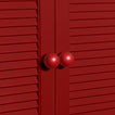 Large sphere knobs in red on cabinet