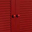 Small sphere knobs in red on cabinet