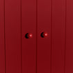 Small sphere knobs in red on cabinet