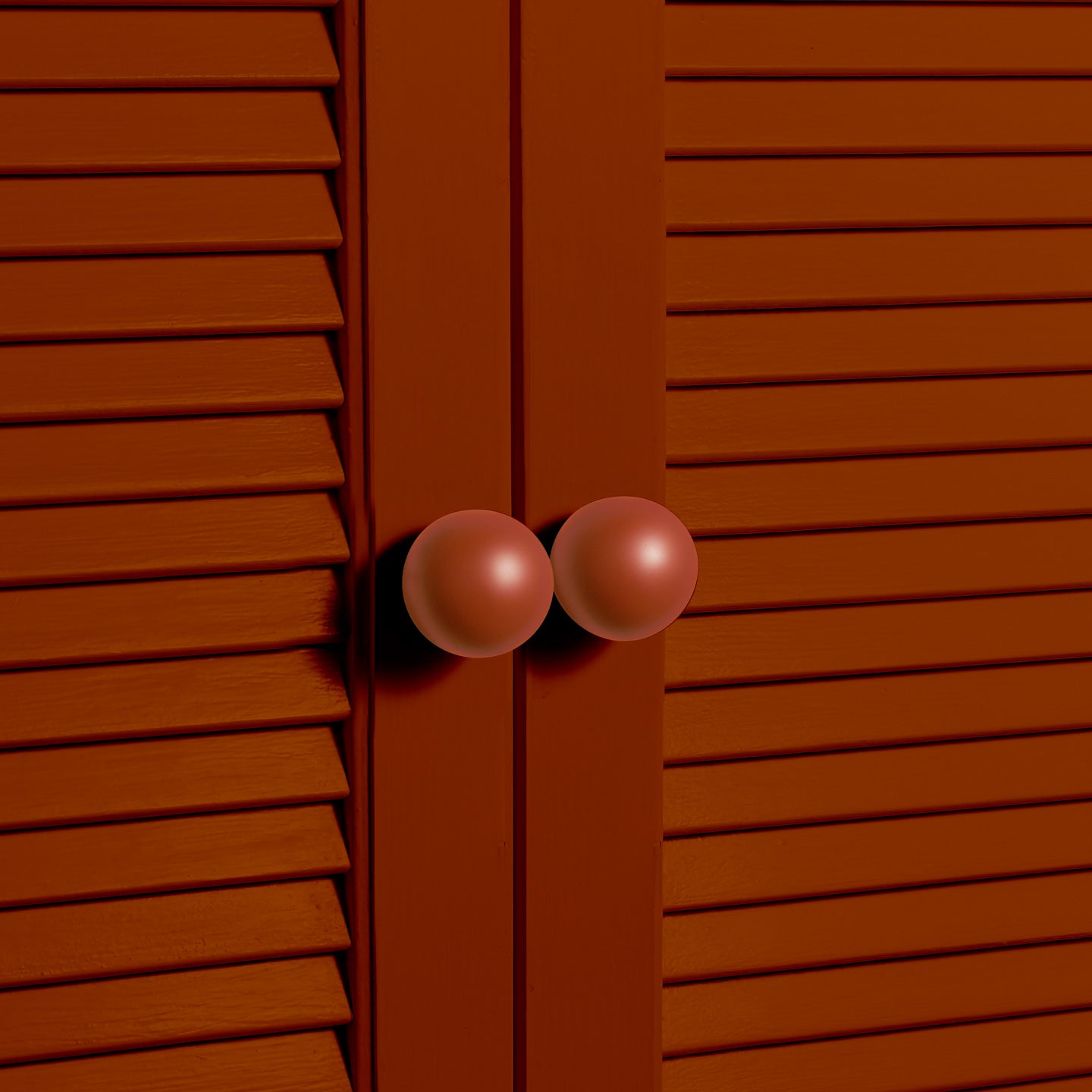 Large terracotta essential sphere knobs on louvered doors